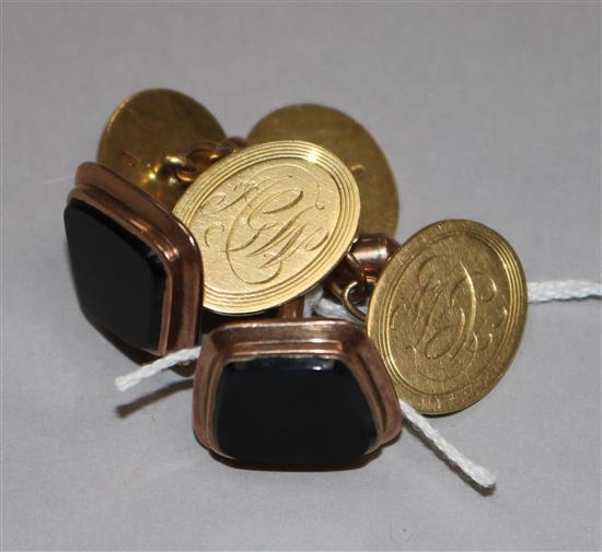A pair of 18ct gold cufflinks and a pair of 9ct gold and black onyx set cufflinks.